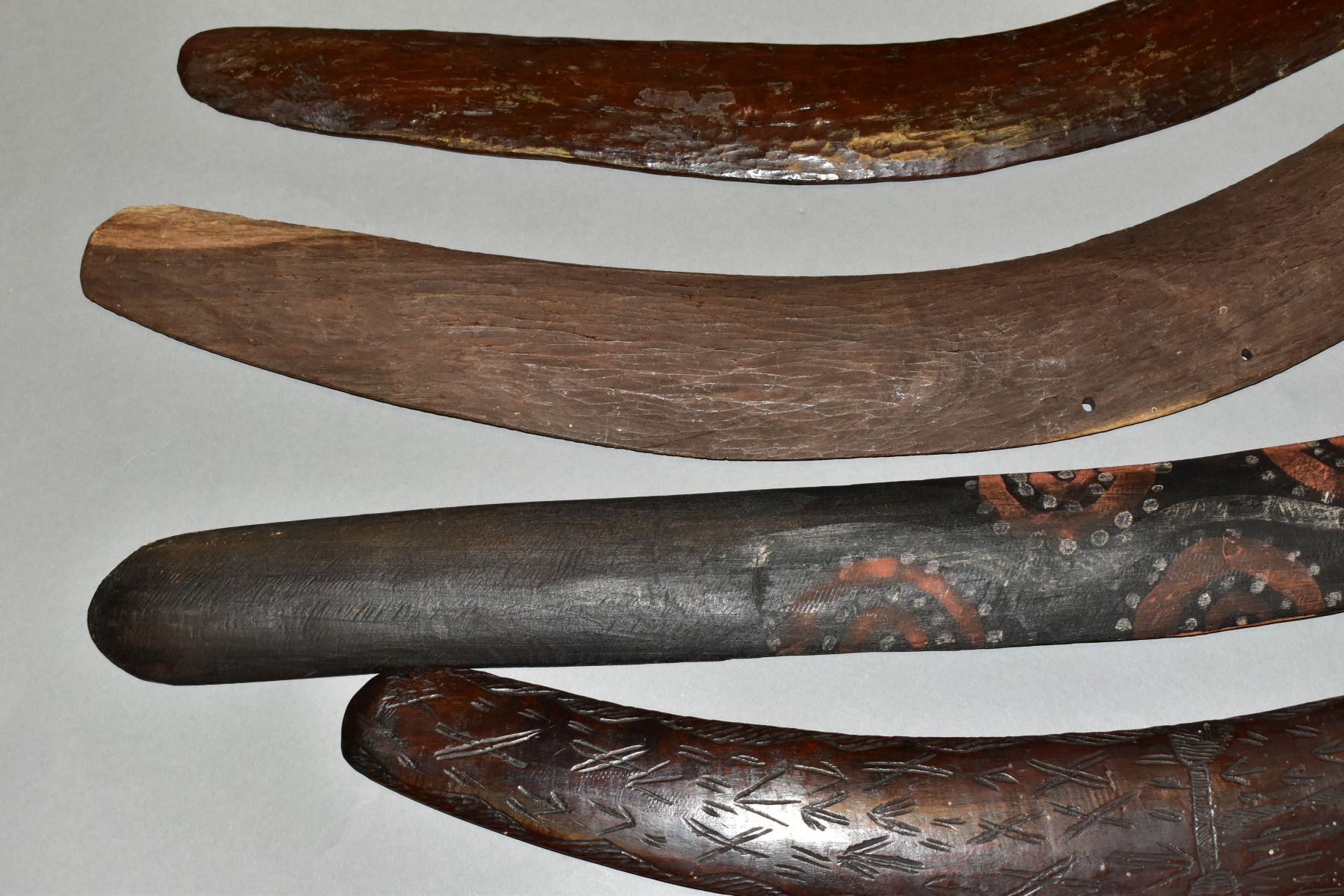 FOUR TRIBAL ART AUSTRALIAN ABORIGINAL BOOMERANGS, to include one carved to the side of arrows, - Image 3 of 9