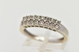 A 9CT WHITE GOLD HALF HOOP DIAMOND RING, designed with two rows of illusion set, single cut