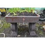 A GLAZED RECTANGULAR PLANTER on twin scrolled supports, later painted, width 62cm x depth 47cm x