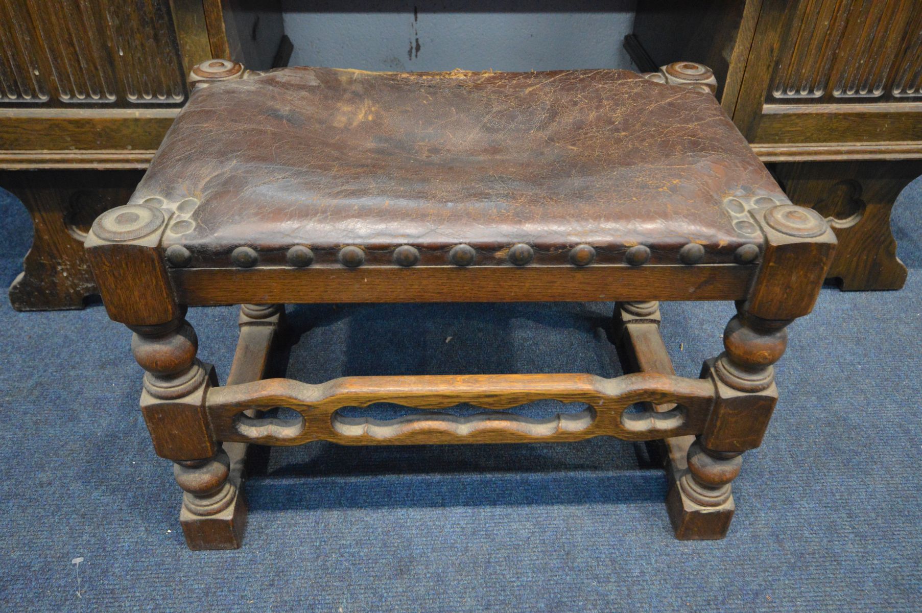 AN OAK GOTHIC DRESSING TABLE with a shaped mirror, two cupboard doors flanking a single drawer, - Image 4 of 5