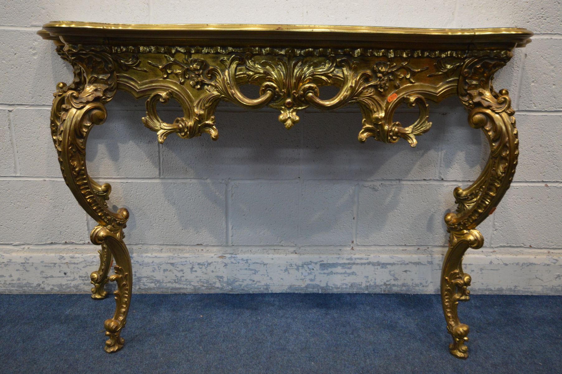 A LATE 20TH CENTURY GILTWOOD FRENCH STYLE HALL TABLE, with a decorated mirror top on four legs, - Image 3 of 4