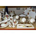 A ROYAL ALBERT OLD COUNTRY ROSES DINNER AND TEA SERVICE, comprising a part boxed cake slice, salt