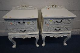 A PAIR OF WHITE VICTORIAN STYLE BEDSIDE CABINETS with a raised back and two drawers, width 50cm x