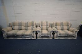 A STRIPPED UPHOLSTERED THREE PIECE SUITE, comprising two sized sofas and an armchair