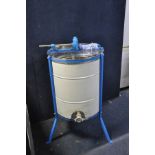 AN EIGHT FRAME HONEY EXTRACTOR, diameter 53cm x height 100cm