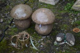 A PAIR OF GLAZED GARDEN MUSHROOMS, along with a garden ornament of two hedgehogs and a small plant