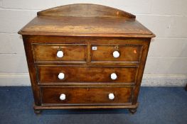 A DISTRESSED VICTORIAN SCUMBLED PINE CHEST OF TWO SHORT OVER TWO LONG, raised arched back, later