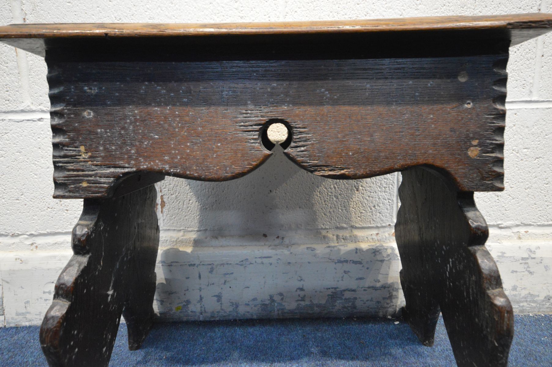 A GEORGIAN BOARDED OAK STOOL, a single plank top to twin shaped supports, width 51cm x depth 30cm - Image 4 of 6