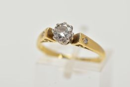 A YELLOW METAL DIAMOND RING, designed with a claw set, round brilliant cut diamond, total