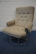 A TERANCE CONRAN FOR HABITAT CHROME AND UPHOLSTERED SWIVEL CHAIR