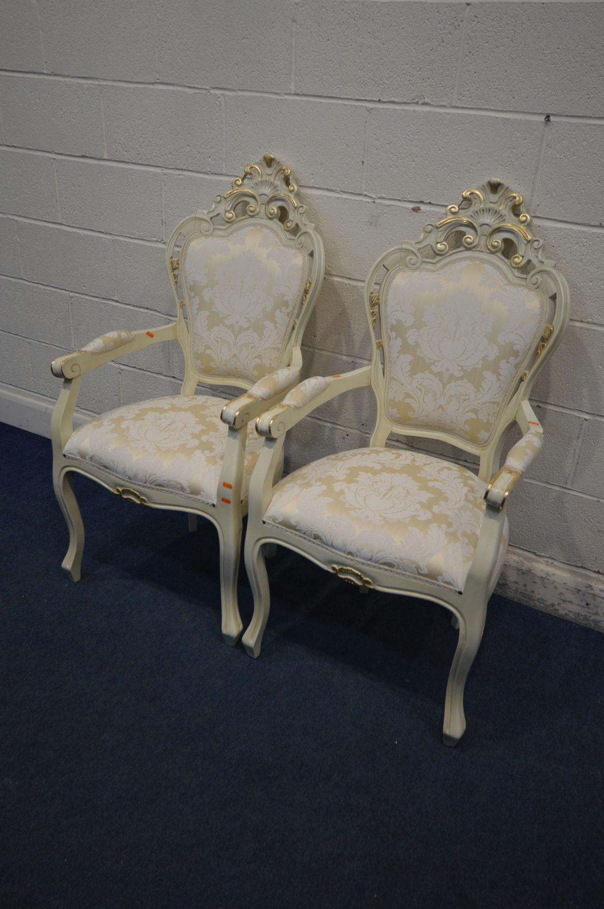 A PAIR OF LATE 20TH CENTURY WHITE CONTINENTAL OPEN ARMCHAIRS