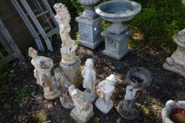SEVEN VARIOUS GARDEN FIGURES, to include males and females ornaments, one on a plinth