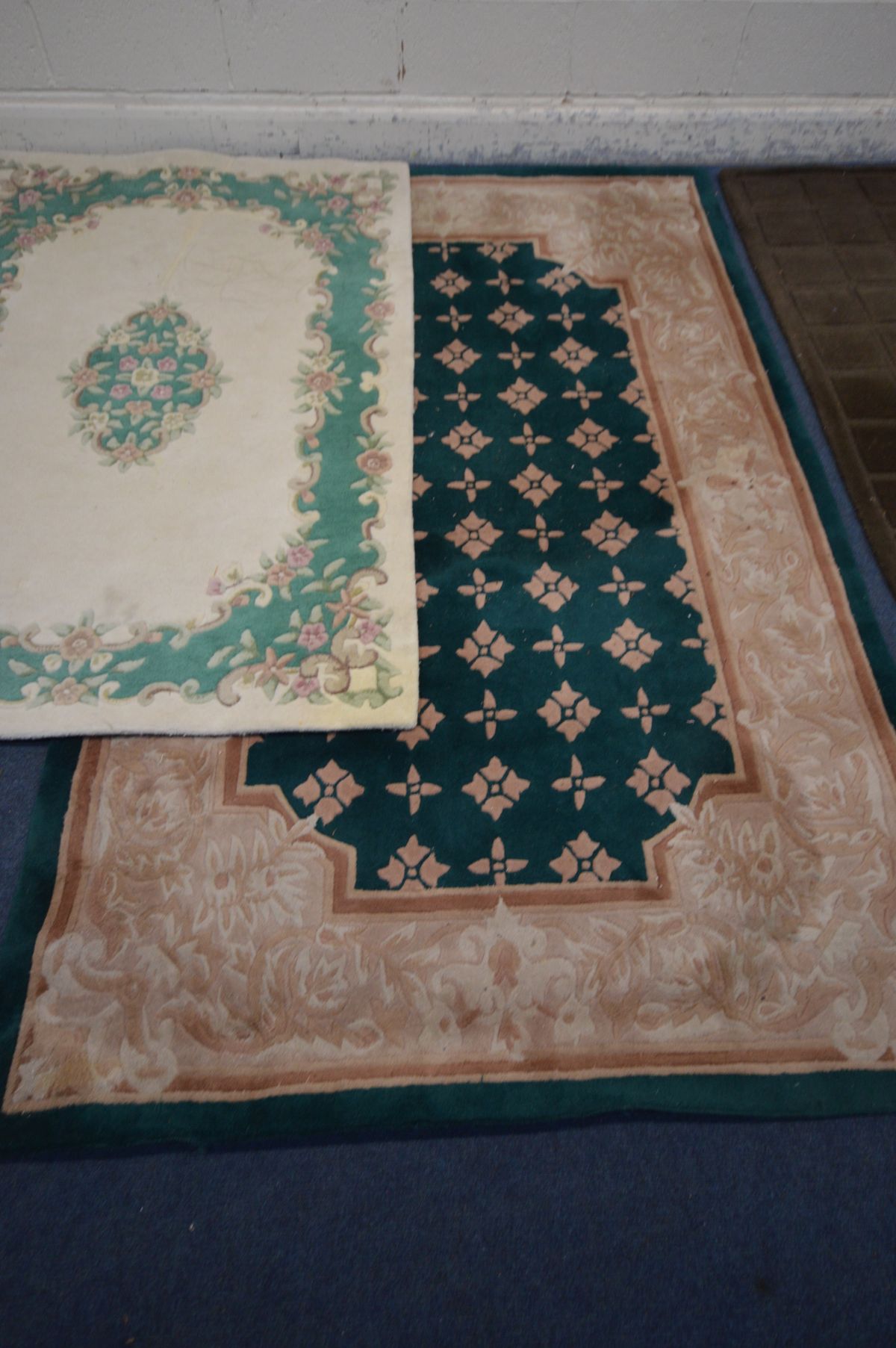 A LARGE GREEN CHINESE WOOLEN RUG, 240cm x 150cm, two similar cream and green ground rugs, both 180cm - Image 3 of 4