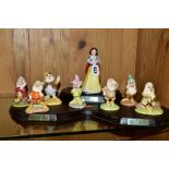 ROYAL DOULTON WALT DISNEY SNOW WHITE AND THE SEVEN DWARFS FIGURES, 'Snow White' SW9, 'Doc' SW010,