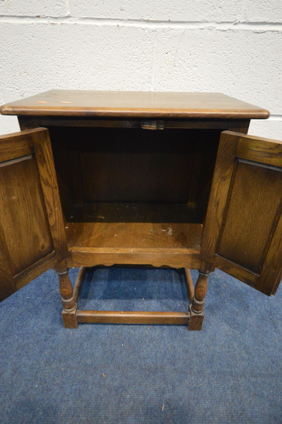 A SMALL OAK GOTHIC TWO DOOR CABINET, width 51cm x depth 33cm x height 68cm - Image 2 of 2