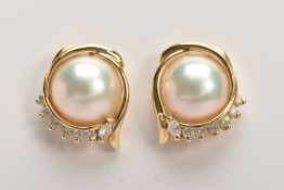 A MODERN PAIR OF DIAMOND AND MABE PEARL STUD EARRINGS, post and scroll fitting, round brilliant