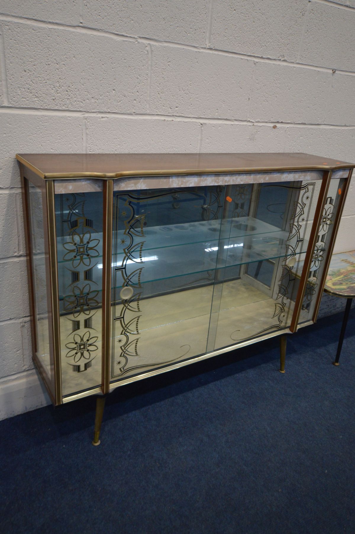 A MID 20TH CENTURY WALNUT FINISH CHINA CABINET, double sliding glass decorated doors enclosing a - Image 2 of 3