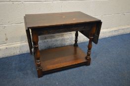 A REPRODUCTION OAK DOUBLE DROP END OCCASSIONAL TABLE, open width 106cm x width 64cm x depth 40cm x