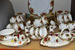 A ROYAL ALBERT OLD COUNTRY ROSES PART DINNER SERVICE AND ORNAMENTAL WARES, comprising ten dinner