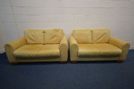 A PAIR OF CREAM/YELLOW LEATHER SOFITALIA SETEES, inner width 109cm