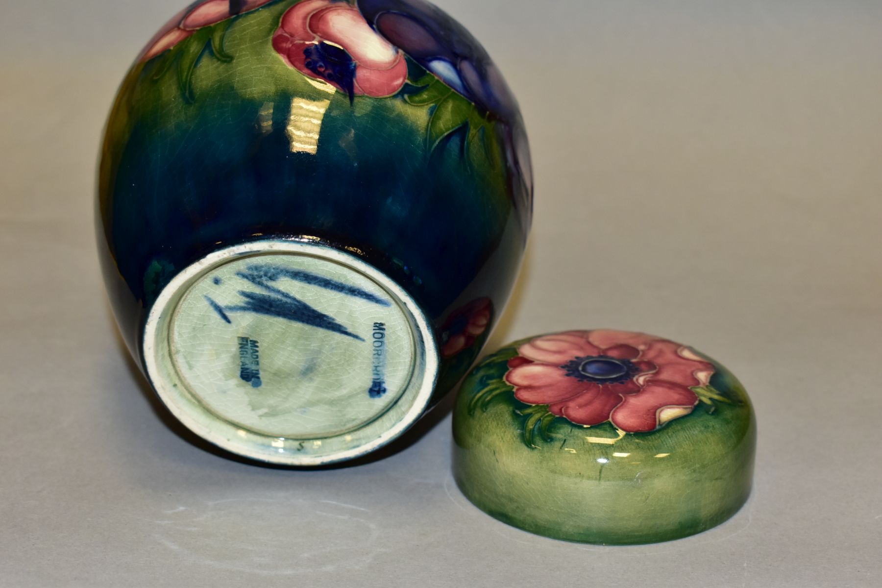 A MOORCROFT POTTERY GINGER JAR AND COVER, decorated in pink/blue anemone on a green ground, - Image 6 of 6