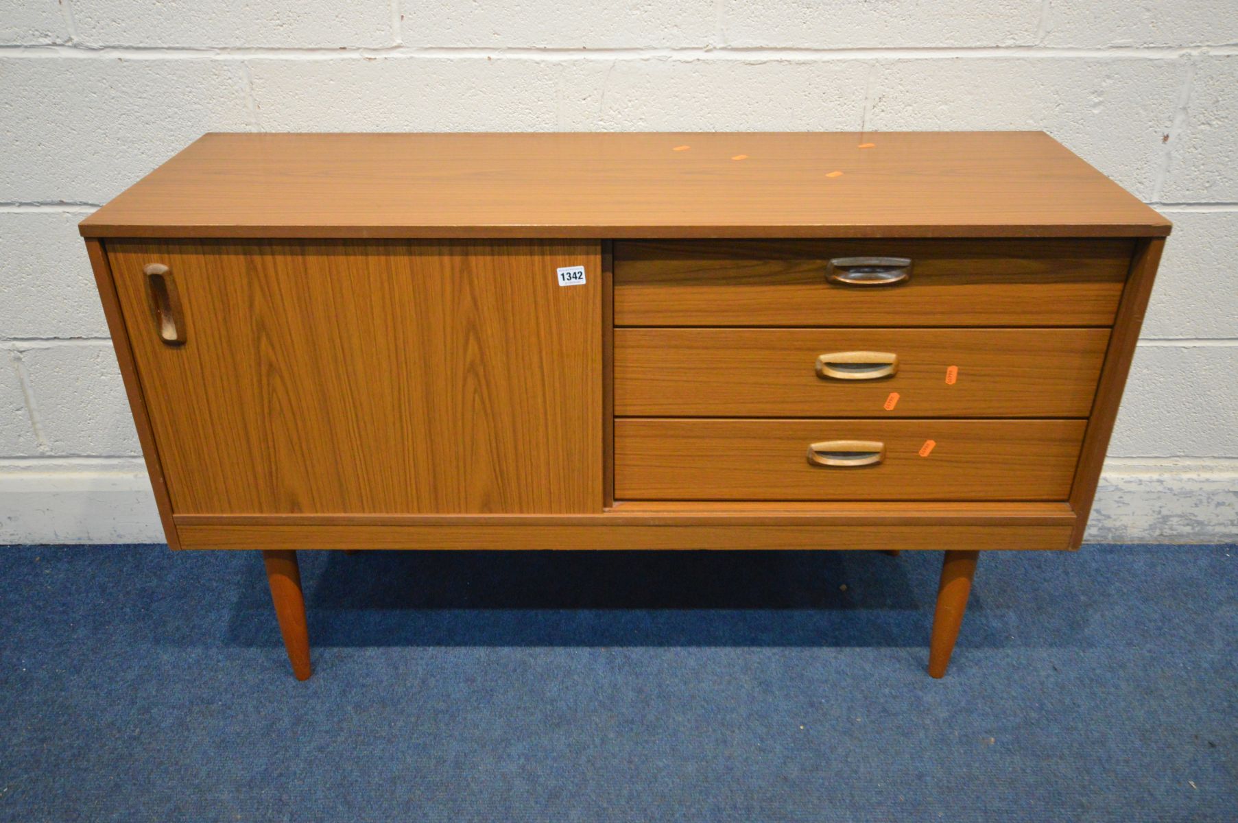 A SCHREIBER TEAK EFFECT SIDEBOARD, with a single sliding door and three drawers, width 123cm x depth