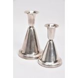 TWO NORWEGIAN SILVER DOMED CANDLESTICKS, each of a plain polished design, on round weighted bases,