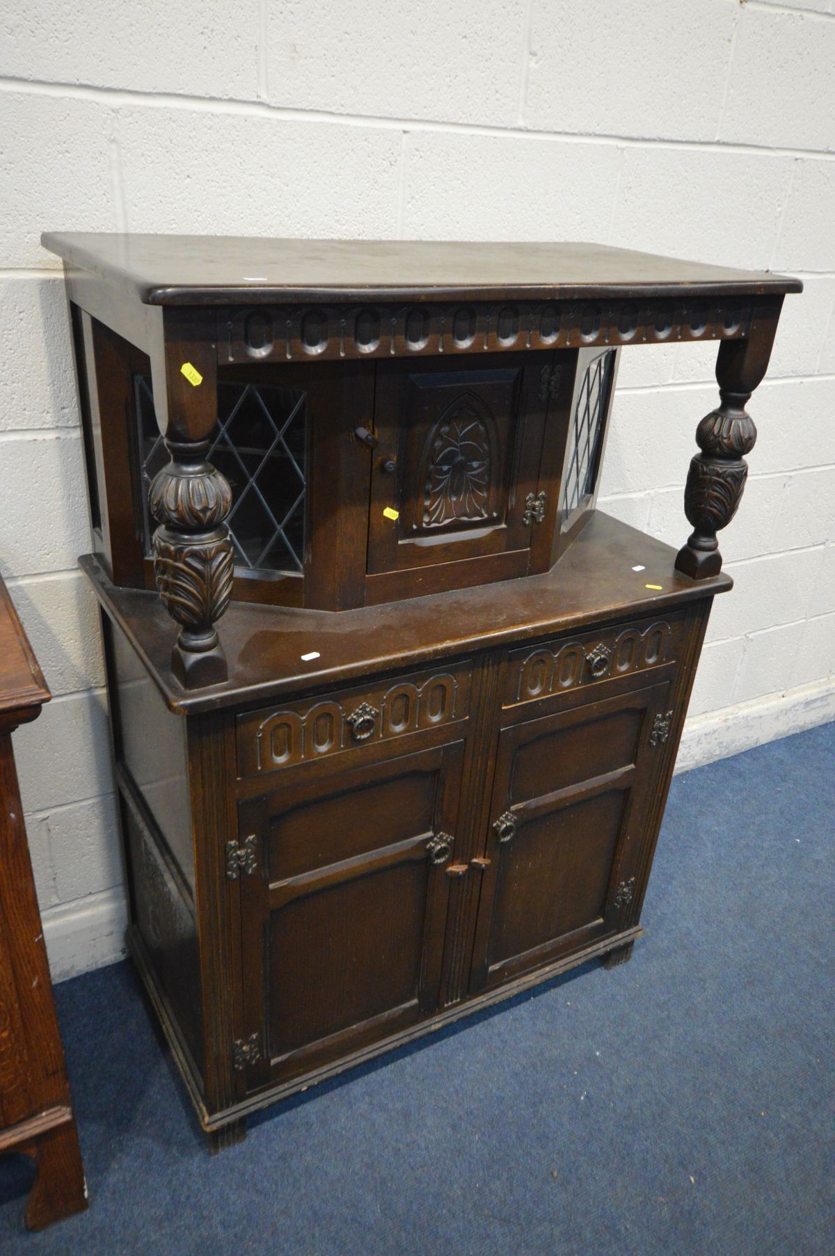 AN EARLY 20TH CENTURY OAK SIDEBOARD, with a raised back, one central drawer and cupboard door - Image 2 of 4