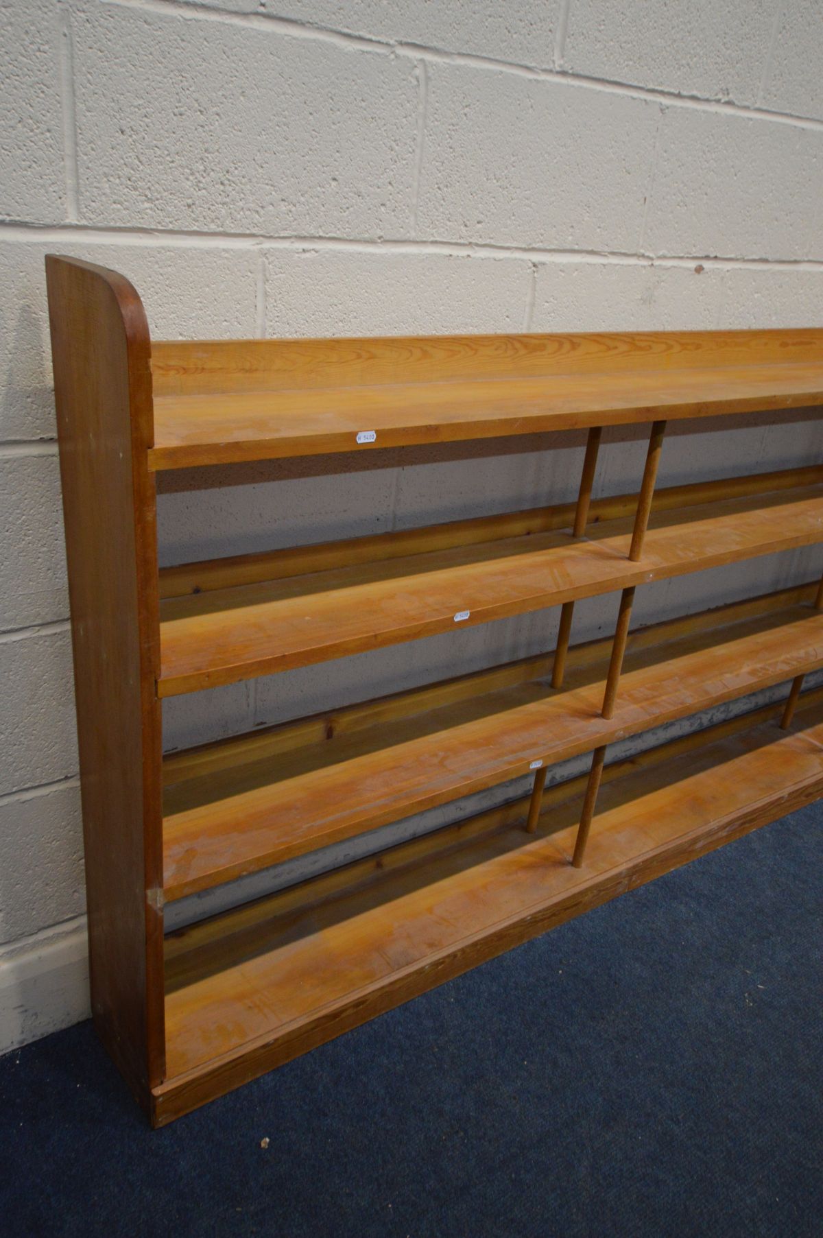 A LOW PINE THREE TIER OPEN BOOKCASE, length 244cm x depth 20cm x height 105cm - Image 2 of 2