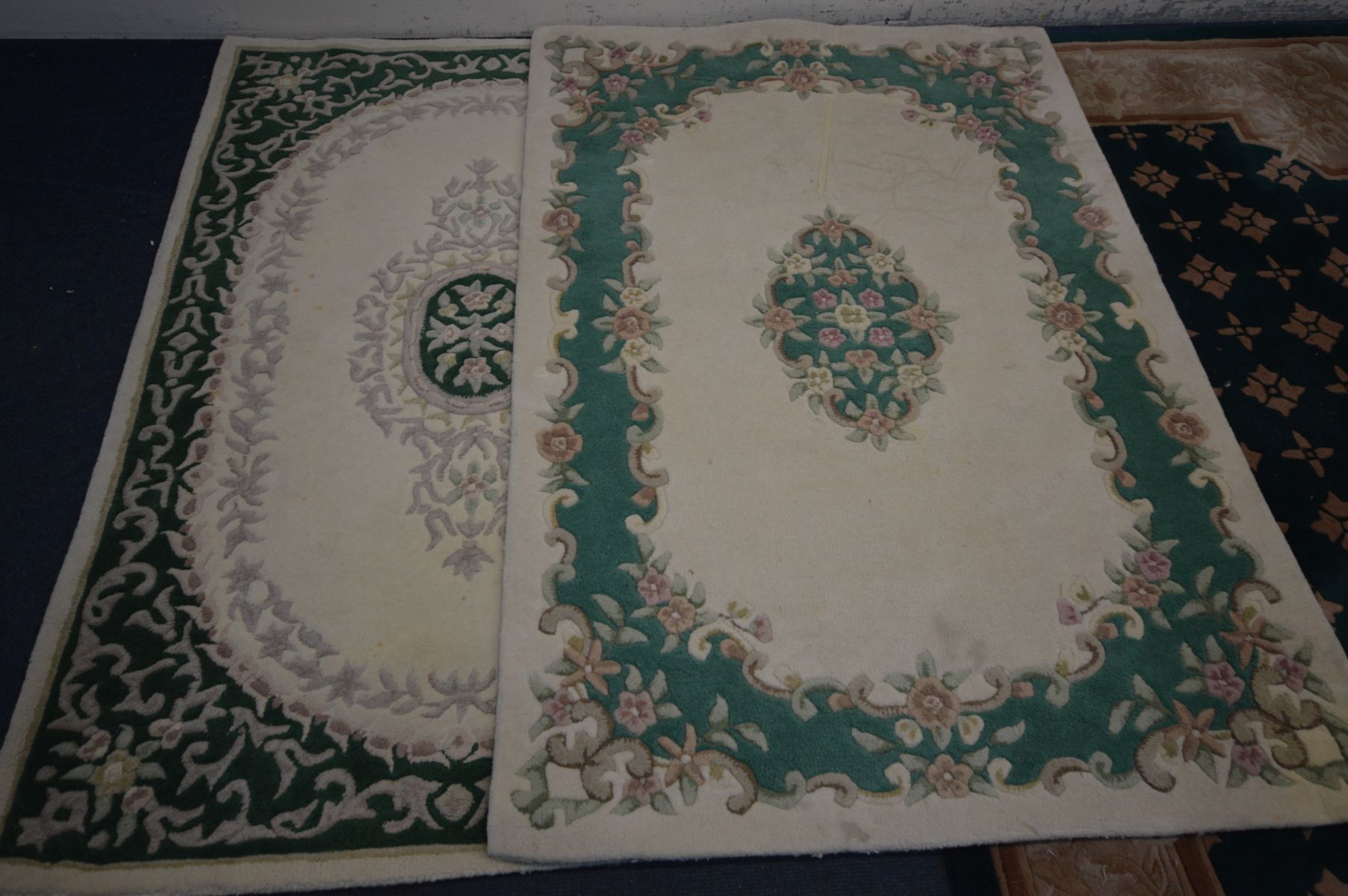 A LARGE GREEN CHINESE WOOLEN RUG, 240cm x 150cm, two similar cream and green ground rugs, both 180cm - Image 2 of 4