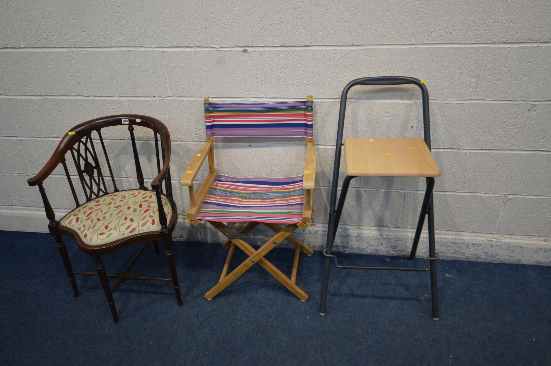 AN EDWARDIAN MAHOGANY AND STRUNG CORNER CHAIR together with a beech director's chair and a modern