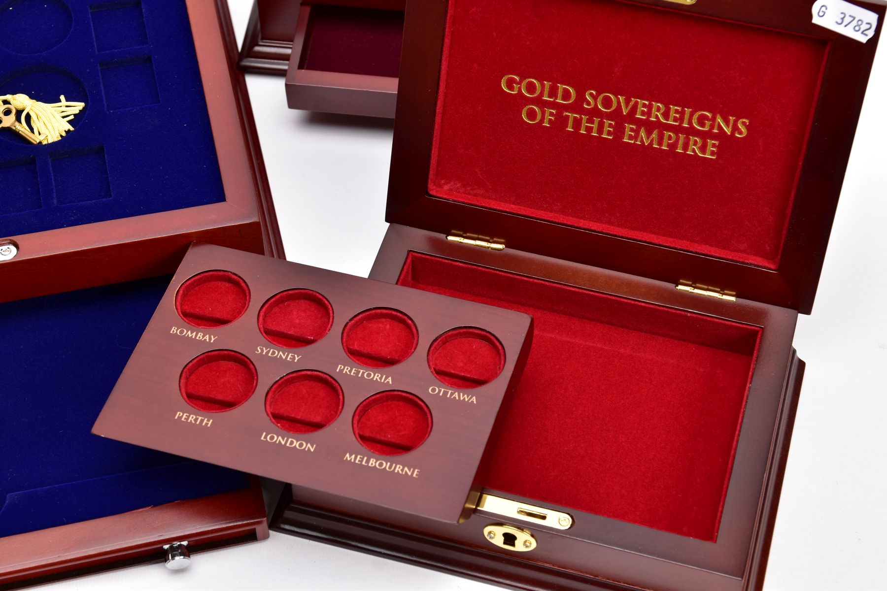 THREE EXECUTIVE COIN CASES to include a seven sovereign case of sovereigns of the Empire, a ten US - Image 2 of 7
