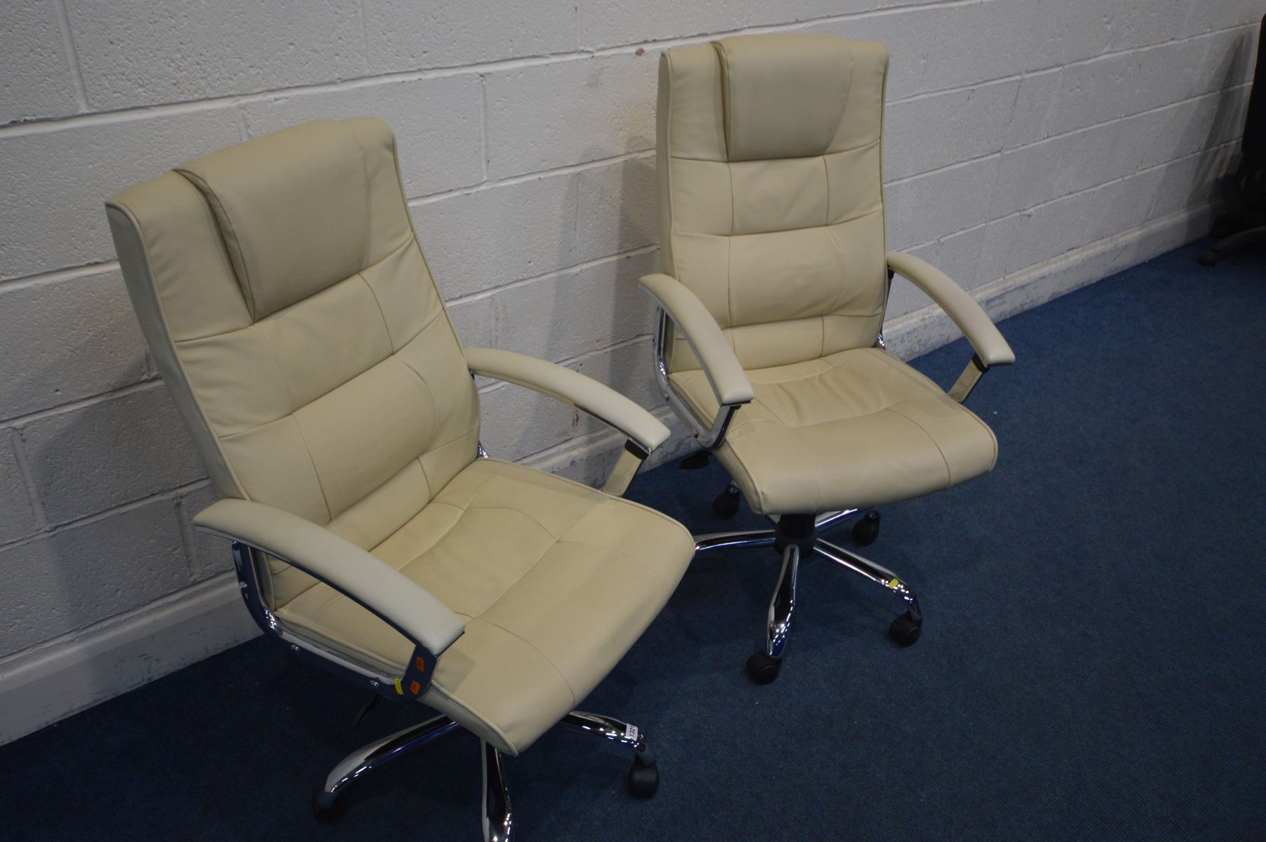 A PAIR OF CREAM FAUX LEATHER OFFICE SWIVEL CHAIRS on chrome frames - Image 2 of 3