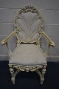 A CREAM PAINTED CONTINENTAL OPEN ARMCHAIR with a sunburst back on a crinoline stretcher