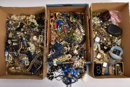 THREE BOXES OF ASSORTED COSTUME JEWELLERY AND ITEMS, to include a quantity of beaded necklaces,