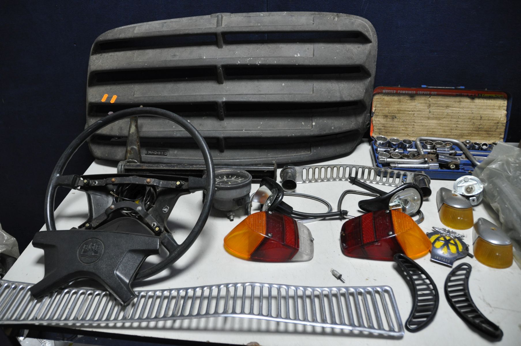 A COLLECTION OF VINTAGE CAR PARTS AND TOOLS, possibly from a Volkswagen Beetle along with partial - Image 2 of 3