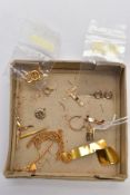 A BOX OF YELLOW METAL PIECES, to include a textured tapered pendant, stamped 375, an a/f yellow