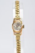 A WRISTWATCH, the Mu Du wristwatch with 18ct gold head and gold plated expandable strap, with 18ct