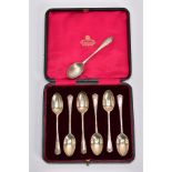 A CASED SET OF EARLY 20TH CENTURY SILVER TEASPOONS AND CASED SET OF SIX TEASPOONS, each with a