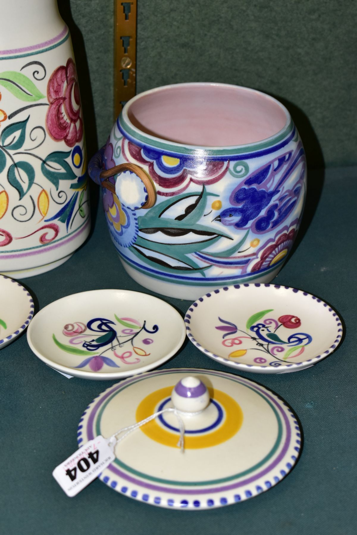 A GROUP OF POOLE POTTERY, comprising a biscuit barrel, Bluebird design, impressed backstamp (one - Image 6 of 7