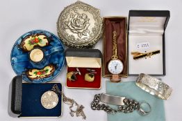 A BOX OF MISCELLANEOUS ITEMS, to include a silver hinged bangle, decorative floral and foliate