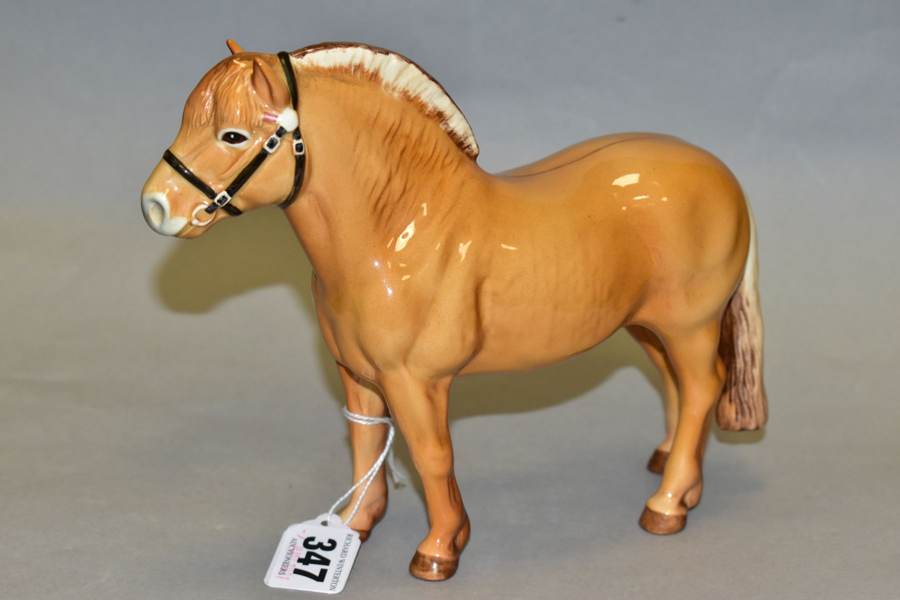 A BESWICK NORWEGIAN FJORD HORSE, model no 2282, dun gloss, printed mark to the underside, adhesive - Image 3 of 5
