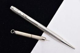 A SILVER PROPELLING PENCIL AND A SILVER CIGAR PIERCER, the propelling pencil with an engine turn