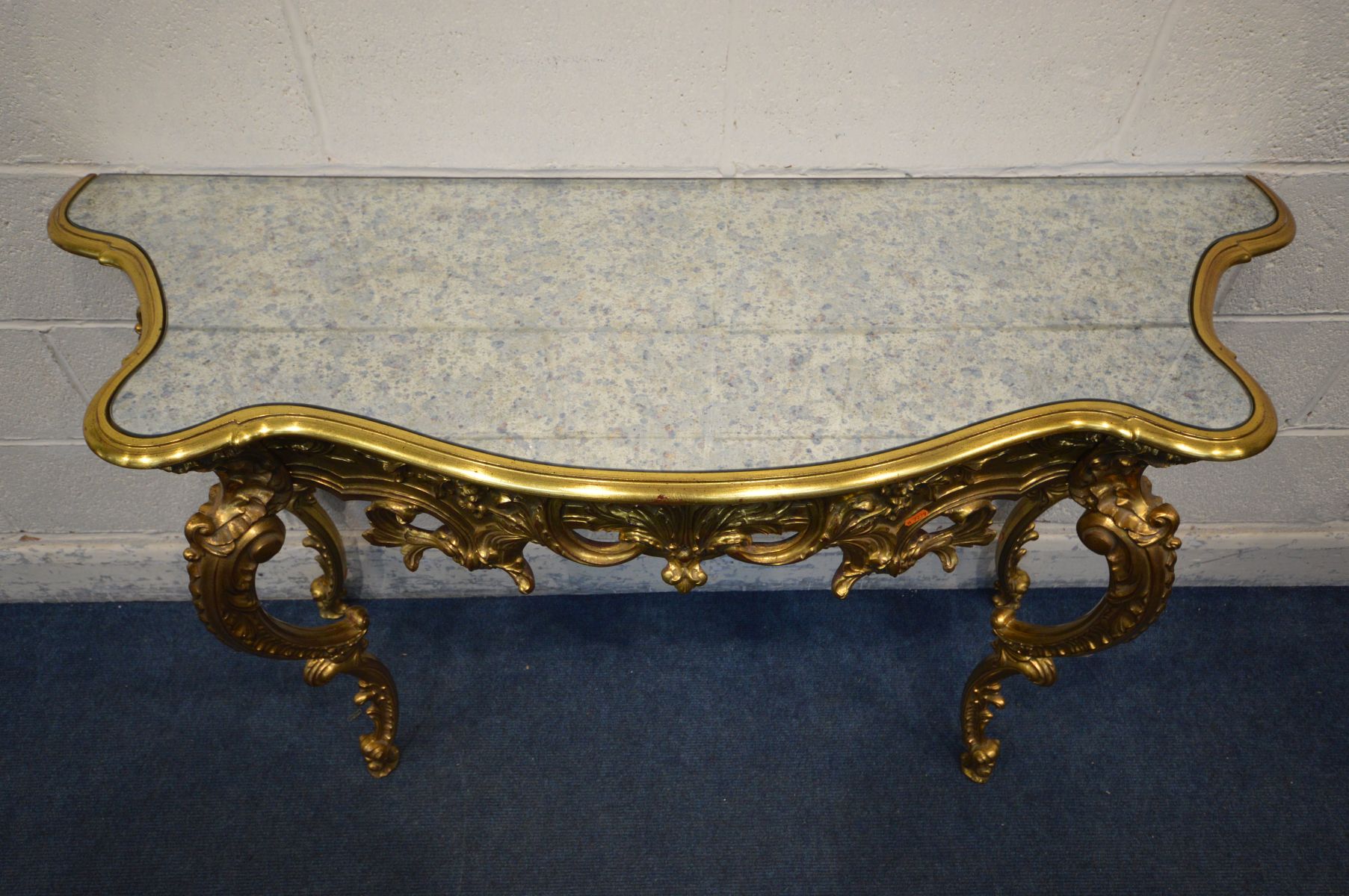 A LATE 20TH CENTURY GILTWOOD FRENCH STYLE HALL TABLE, with a decorated mirror top on four legs, - Image 2 of 4