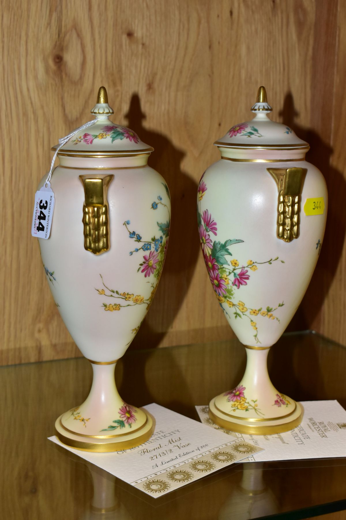 A PAIR OF LATE 20TH CENTURY ROYAL WORCESTER BLUSH IVORY LIMITED EDITION COVERED VASES, 'Floral Mist' - Image 2 of 9