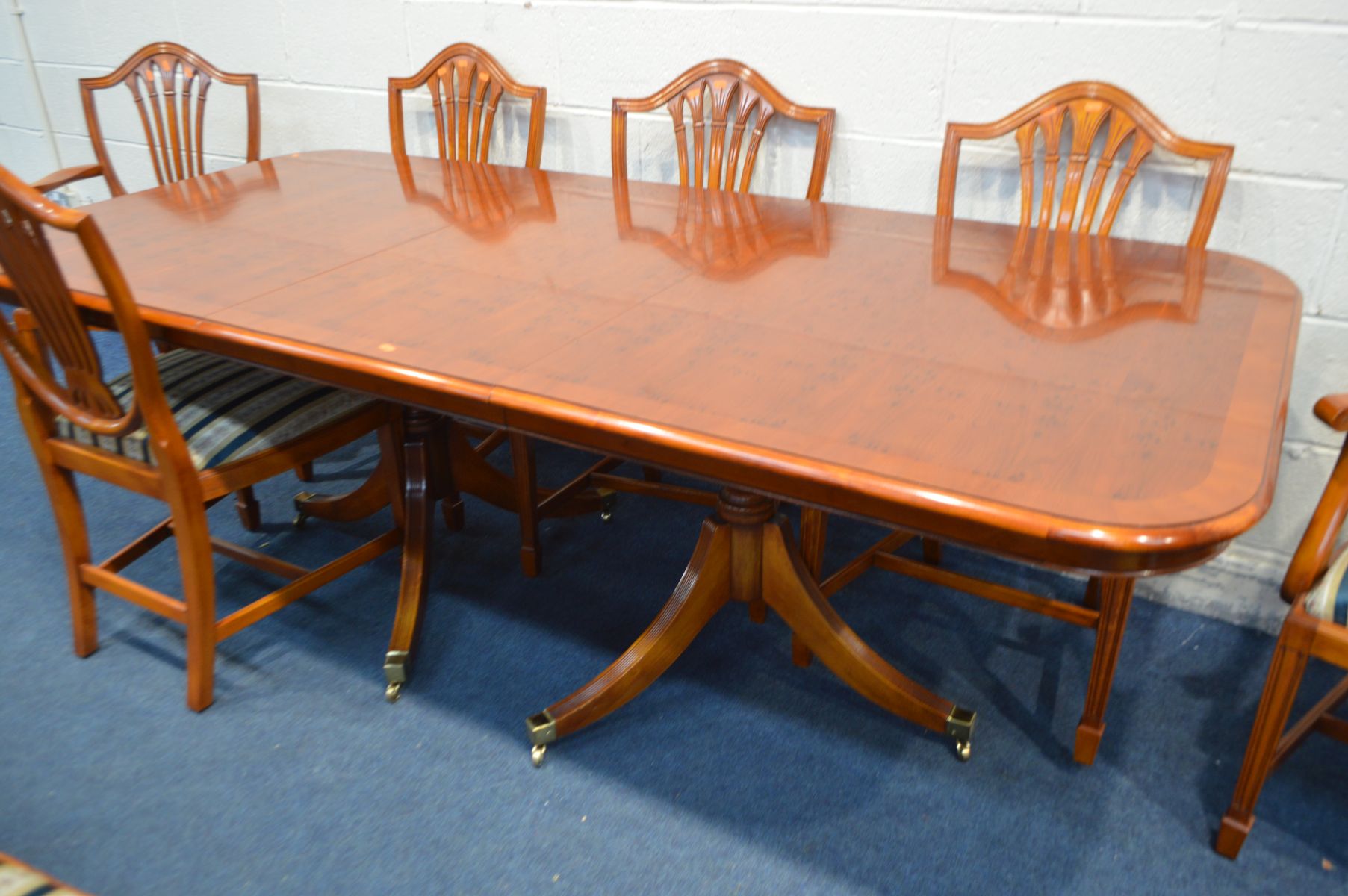 A REPRODUCTION YEWWOOD TWIN PEDESTAL DINING TABLE, with one additional leaf, extended length 217cm x - Image 3 of 3