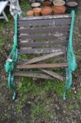 A SINGLE CAST IRON BENCH with lions masks, width 63cm x depth 60cm x height 69cm (distressed teak