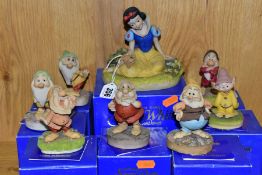 A BOXED SET OF EIGHT ARDEN SCULPTURES OF DISNEY'S SNOW WHITE AND THE SEVEN DWARFS, sculpted by