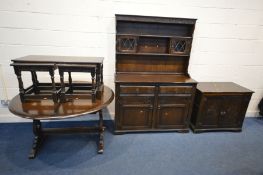 A COLLECTION OF DARK OAK FURNITURE to include an circular extending table, dresser, width 125cm x