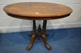 A LATE VICTORIAN WALNUT AND MARQUETRY INLAID LOO TABLE, length